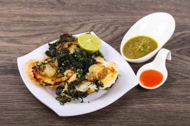 Ispanak ile pişmiş tarak