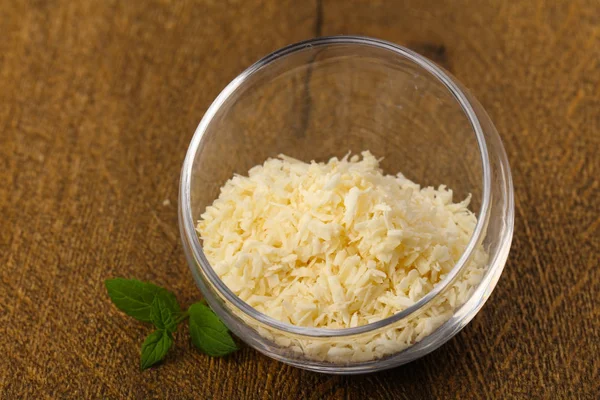 stock image Coconut flakes in the bowl with mint leaves