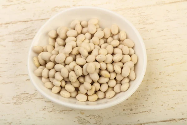 Dry white beans in the bowl — Stock Photo, Image