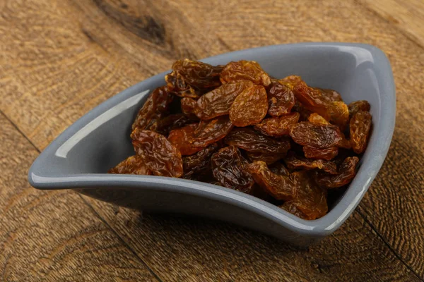 Dry Raisins in the bowl — Stock Photo, Image