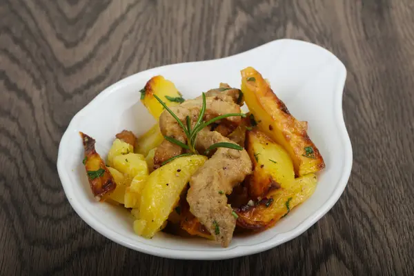 Fried potato with pork — Stock Photo, Image