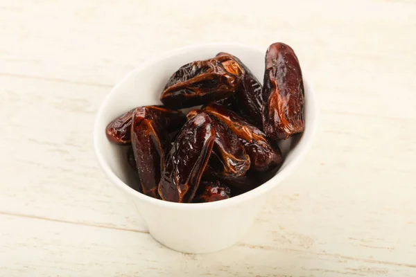 Sweet dates in the bowl — Stock Photo, Image