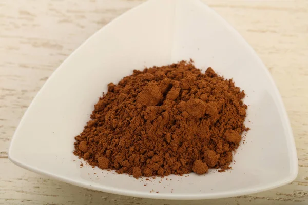Какао-порошок в миске — стоковое фото