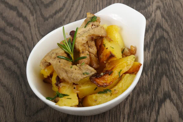 Fried potato with pork — Stock Photo, Image