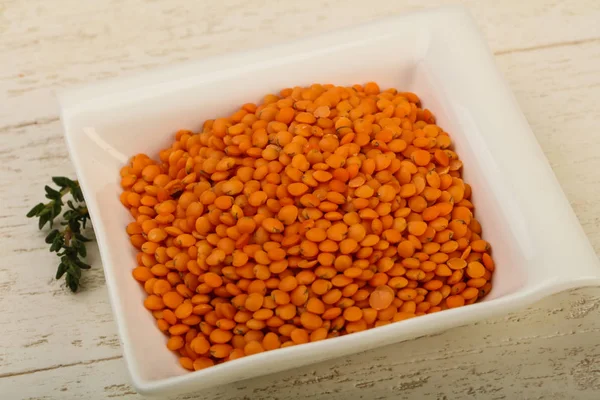 Orange lentil in the bowl — Stock Photo, Image