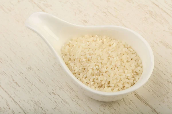 Raw rice heap in the bowl