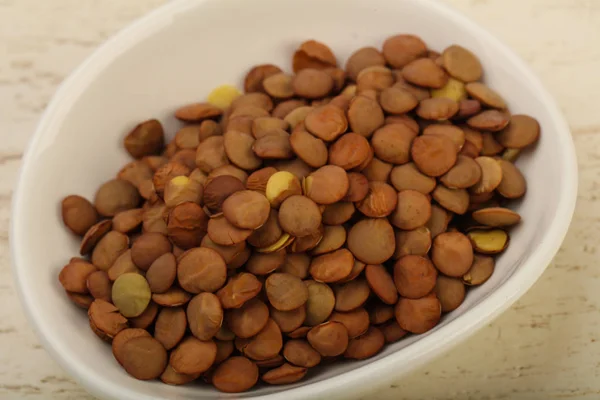 Lentilhas cruas na tigela — Fotografia de Stock