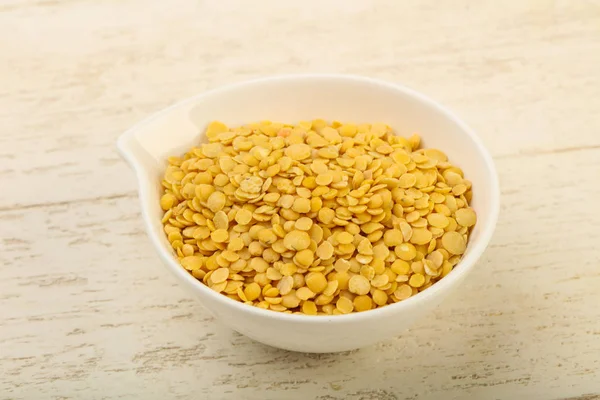 Yellow lentil in the bowl