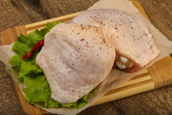 Raw chicken thighs