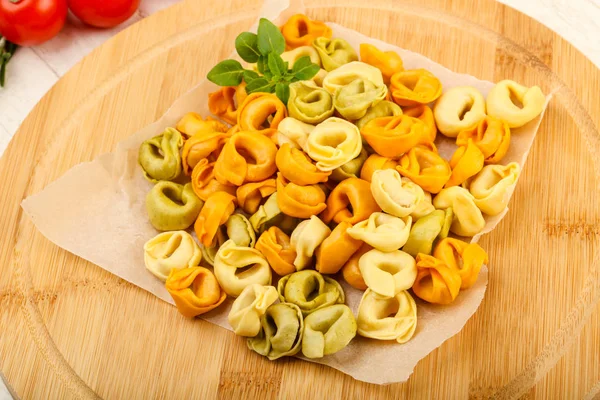 Raw tortellini on board — Stock Photo, Image