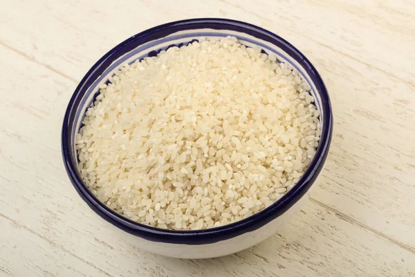 Haldy syrovou rýži v misce — Stock fotografie