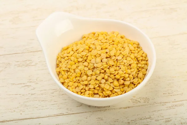 Yellow lentil  in the bowl