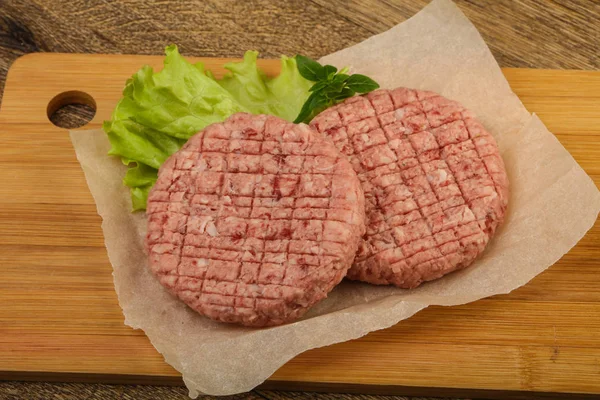 Raw burger cutlets