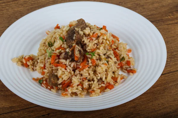 Pilaf with meat and carrot — Stock Photo, Image