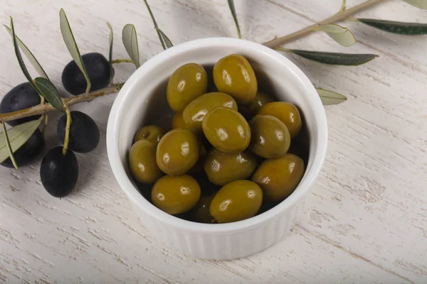 Green olives  in the bowl — Stock Photo, Image