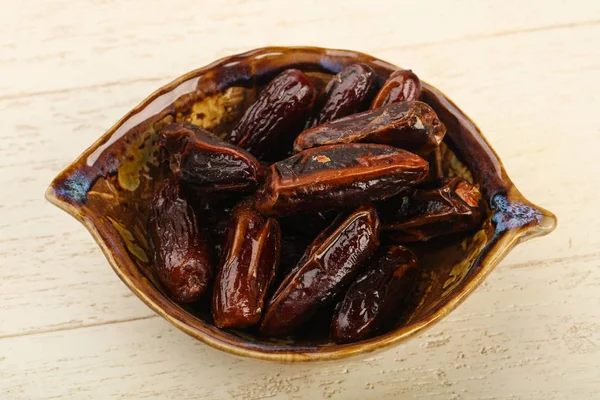 Sweet dates in the bowl — Stock Photo, Image