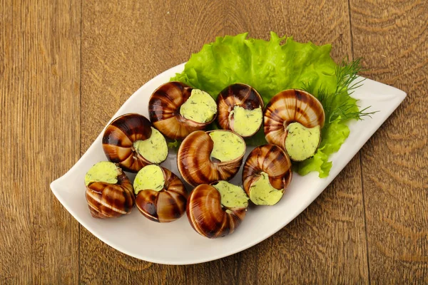 Delicioso Escargot com creme de queijo — Fotografia de Stock