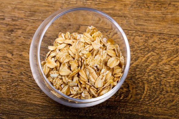 Avena cruda en el tazón —  Fotos de Stock