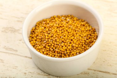 kabın içinde hardal tohumu