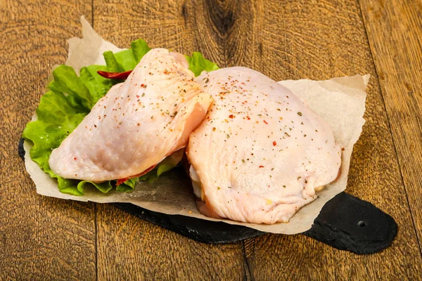 Raw chicken thighs