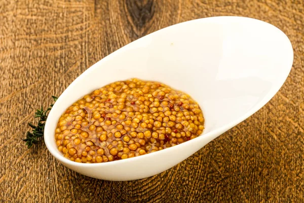 Dijon mustard in the bowl