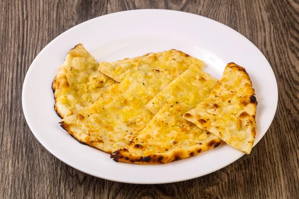 Naan with cheese and garlic — Stock Photo, Image