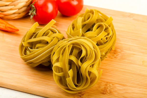 Raw fettucine pasta — Stock Photo, Image