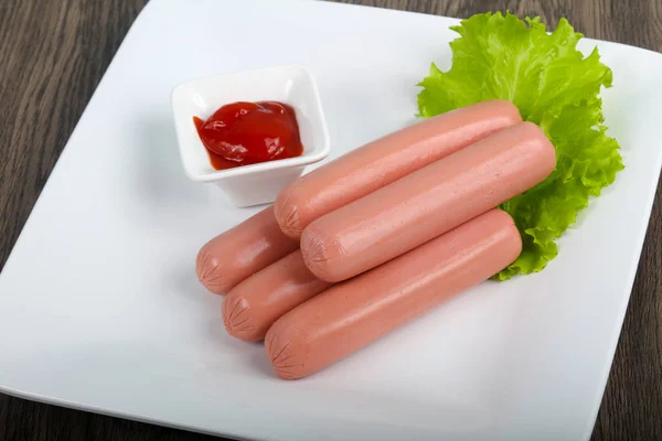 Boiled Sausages with ketchup — Stock Photo, Image