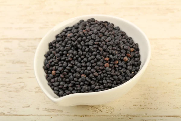 Kabın içinde siyah mercimek