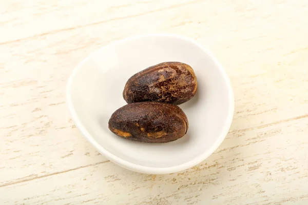 Two Nutmegs for culinary — Stock Photo, Image