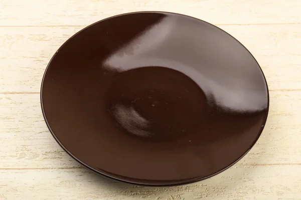 Empty brown plate — Stock Photo, Image