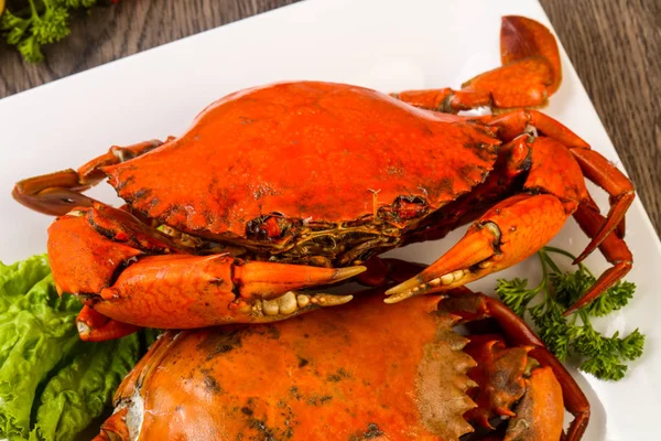 Boiled crab in white plate