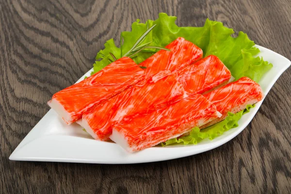 Palitos de cangrejo en el plato — Foto de Stock