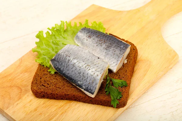 Bread with herring fillet — Stock Photo, Image