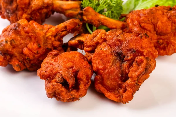 Chicken lollipops with spices