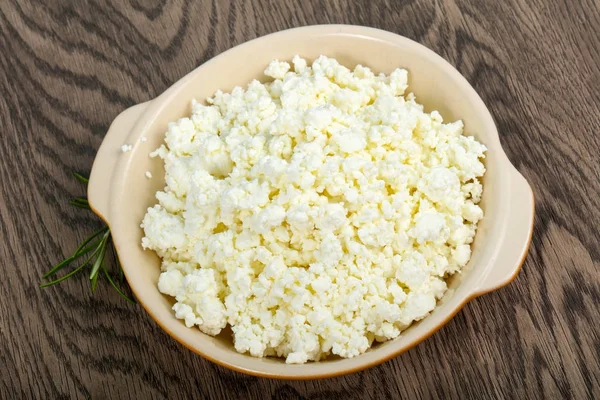 Cottage cheese in white bowl — Stock Photo, Image