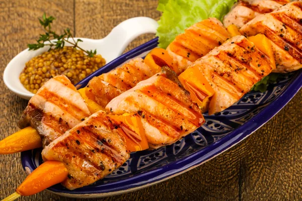 Grilled salmon on skewer — Stock Photo, Image