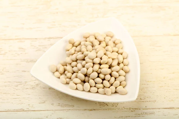 Raw White beans in bowl