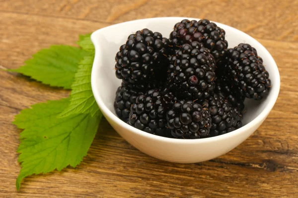 Blackberries heap in bowl — Stock Photo, Image