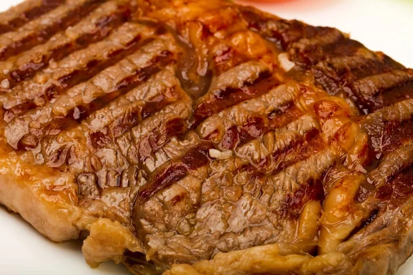 Grilovaný Rib Eye Steak Dřevěný Stůl Pozadí — Stock fotografie