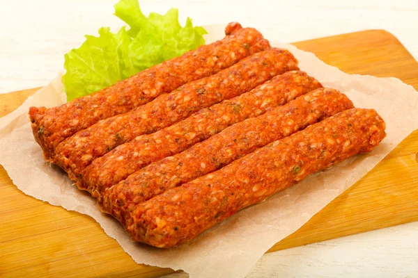 Raw beef sausages — Stock Photo, Image