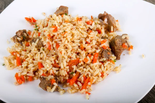 Plov with meat and carrot — Stock Photo, Image