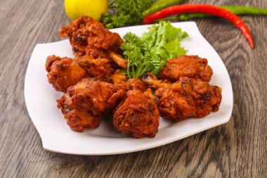 Tavuk lolipop baharatlar ile 