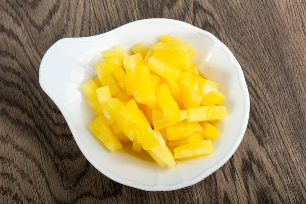 Canned pineapple in bowl