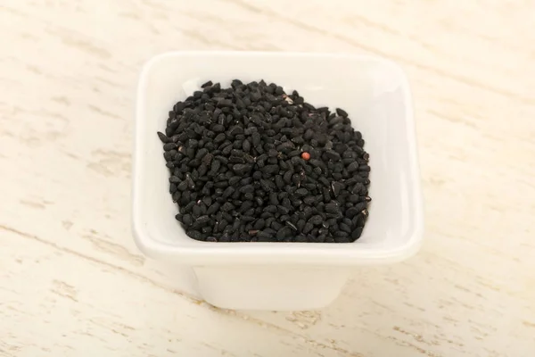 Negro nigella semillas montón —  Fotos de Stock