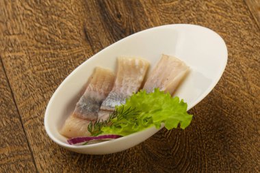 Ringa balığı filetosu ye, ahşap arka plan üzerinde için hazır