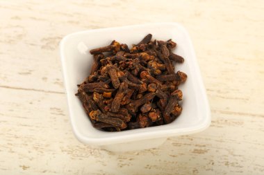 Kase, mutfak, ahşap masa arka plan için baharat tohum karanfil