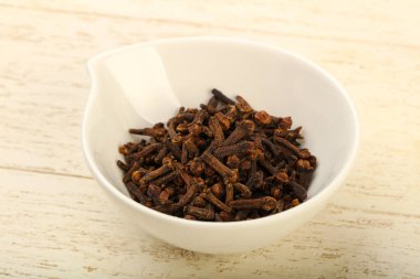 Kase, mutfak, ahşap masa arka plan için baharat tohum karanfil