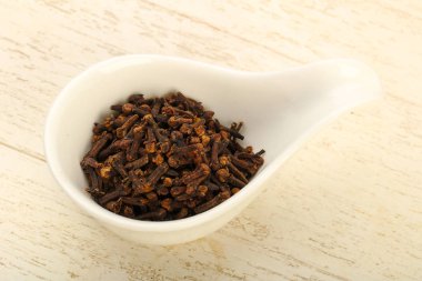 Kase, mutfak, ahşap masa arka plan için baharat tohum karanfil