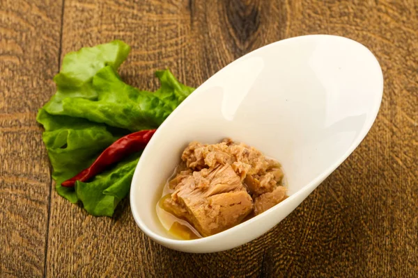 Closeup of canned tuna fish in bowl ready for cooking